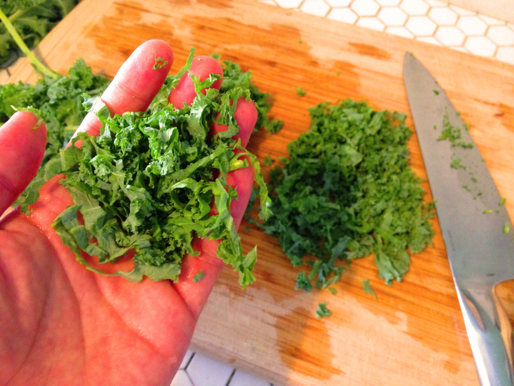 For the Kale Slaw with Sesame Honey Dijon Dressing, finely chop the kale crosswise, for the best texture and ease of eating. Photo © Ben Young Landis.