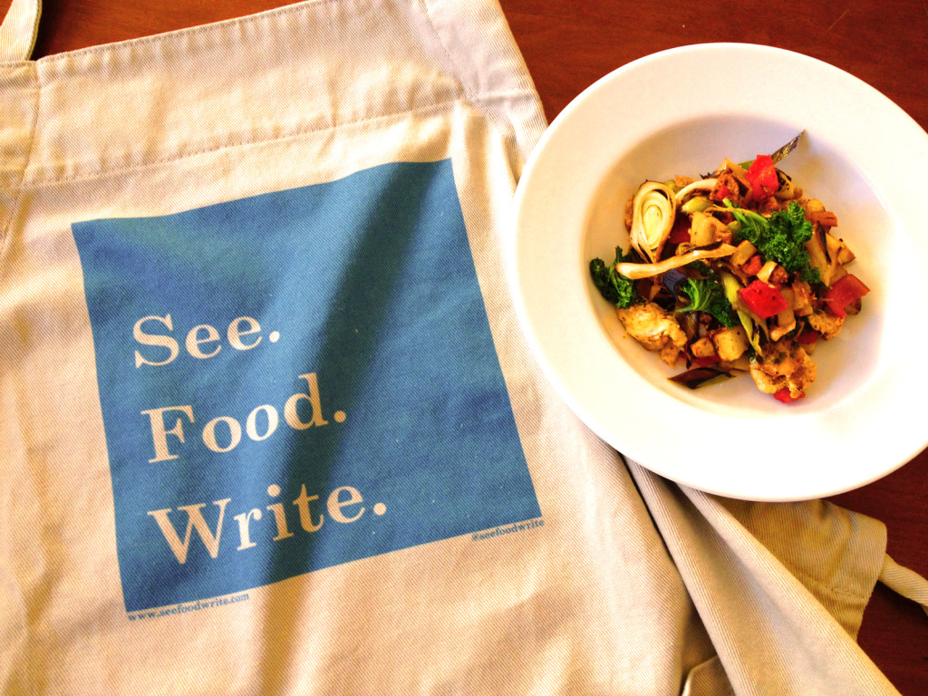 Sponsors at the Patron tier during the Winter 2016 Writing Season received our See. Food. Write. logo apron. Photo © Ben Young Landis.